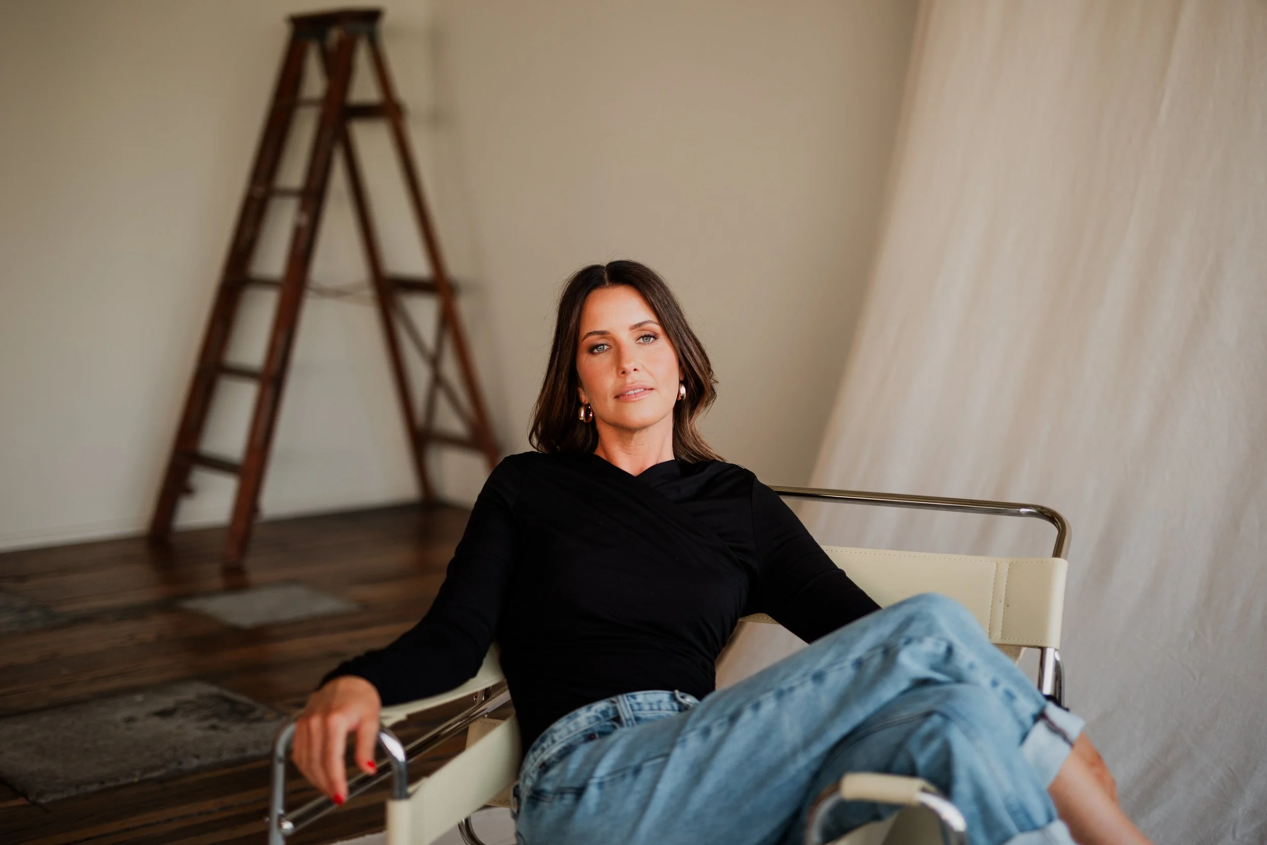 Amy Lea seated in soft natural light